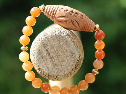 Orange Jade Chalcedony with Beautiful large handmade terracotta beads from Mali (Africa). And Tibetan Style Alloy Spacer Discs