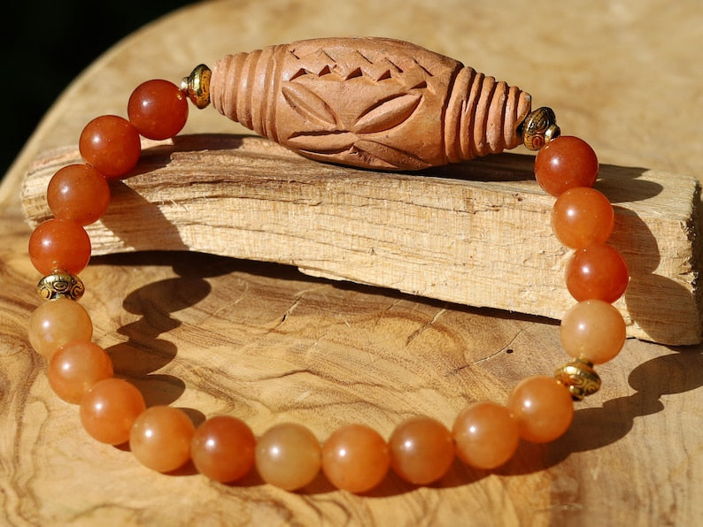 Orange Jade Chalcedony with Beautiful large handmade terracotta beads from Mali (Africa). And Tibetan Style Alloy Spacer Discs