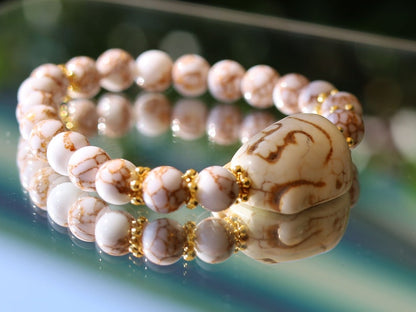 Beautiful large bead of real magnesite: Buddha combined with The healing properties of Netstone. Meaningful & symbolic merchandise
