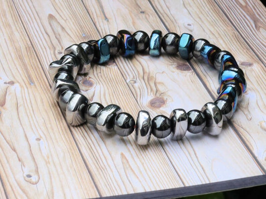 Hematite bracelets with Dzi beads, Heishi beads and Sea Sediment Jasper. Chakra Alignment and grounding.
