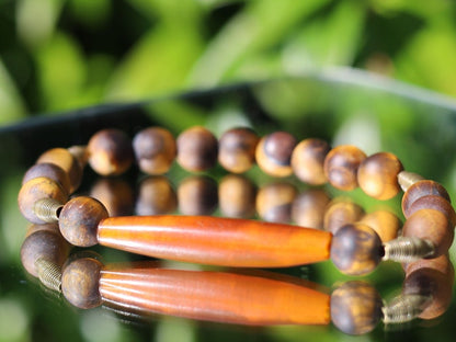 Natural Matte Tiger's Eye Tiger Eye bracelet with Wire beads and  beautiful, large handmade Horn bead. one-of-a-kind jewelry