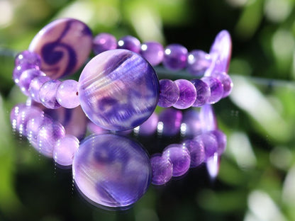 Coin shaped Mother of Pearl Shell beaded bracelet with Amethyst is a natural tranquilizer. powerful way to express your individuality