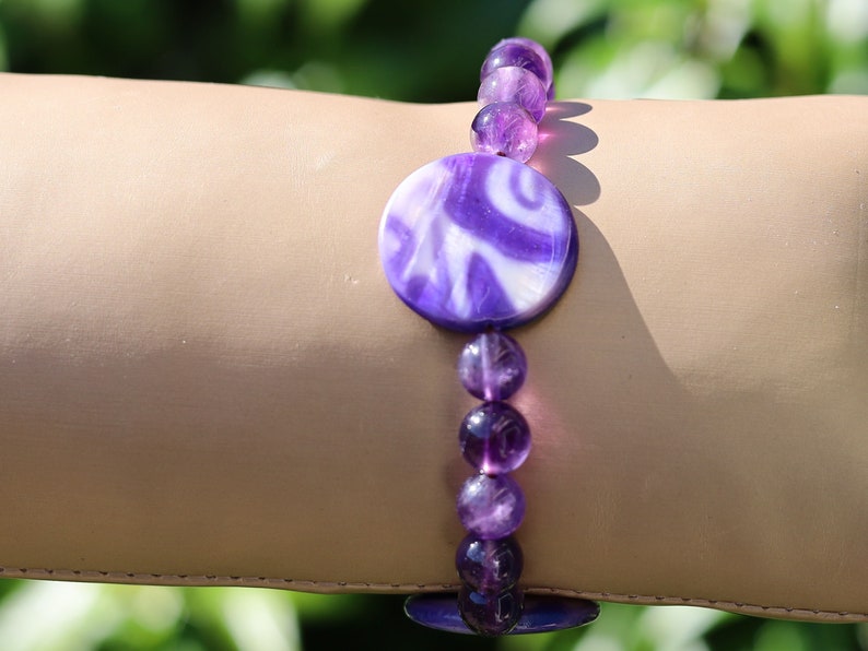 Coin shaped Mother of Pearl Shell beaded bracelet with Amethyst is a natural tranquilizer. powerful way to express your individuality