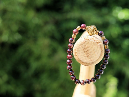 Amazing Dark Red Garnet beaded bracelet with Lovely, large Mala bead and Handmade Indonesia Beads. expressing your taste and style