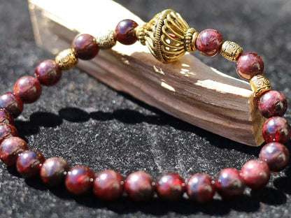Amazing Dark Red Garnet beaded bracelet with Lovely, large Mala bead and Handmade Indonesia Beads. expressing your taste and style