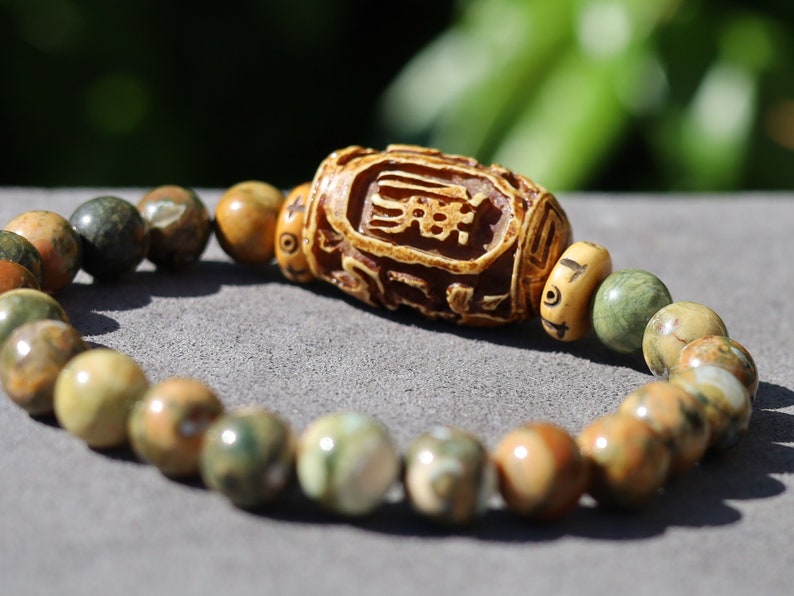 Serene Kambaba Jasper bracelet combined with A very nice, very large bone bead  and beautiful Oxbone Tibetan prayerbeads