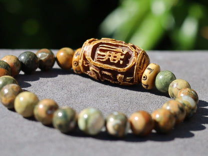 Serene Kambaba Jasper bracelet combined with A very nice, very large bone bead  and beautiful Oxbone Tibetan prayerbeads