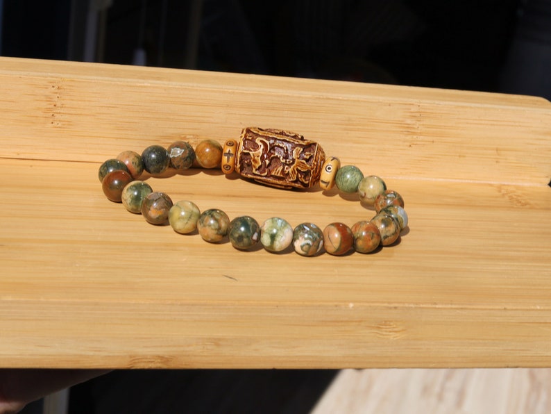 Serene Kambaba Jasper bracelet combined with A very nice, very large bone bead  and beautiful Oxbone Tibetan prayerbeads