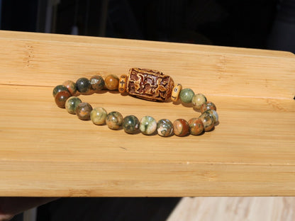 Serene Kambaba Jasper bracelet combined with A very nice, very large bone bead  and beautiful Oxbone Tibetan prayerbeads