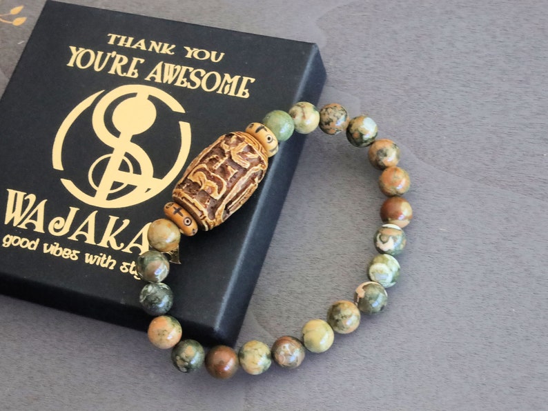 Serene Kambaba Jasper bracelet combined with A very nice, very large bone bead  and beautiful Oxbone Tibetan prayerbeads