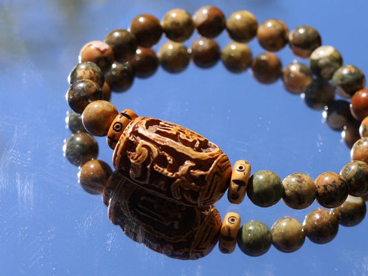 Serene Kambaba Jasper bracelet combined with A very nice, very large bone bead  and beautiful Oxbone Tibetan prayerbeads