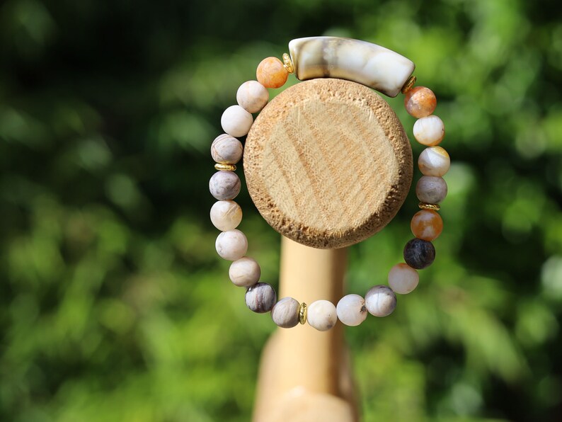 Bamboo leaf agate, also known as bamboo agate or bamboo jasper. Bracelet with acrylic tube bead. Tibetan Style Alloy Spacer Discs.