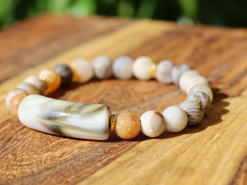 Bamboo leaf agate, also known as bamboo agate or bamboo jasper. Bracelet with acrylic tube bead. Tibetan Style Alloy Spacer Discs.
