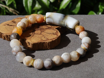 Bamboo leaf agate, also known as bamboo agate or bamboo jasper. Bracelet with acrylic tube bead. Tibetan Style Alloy Spacer Discs.