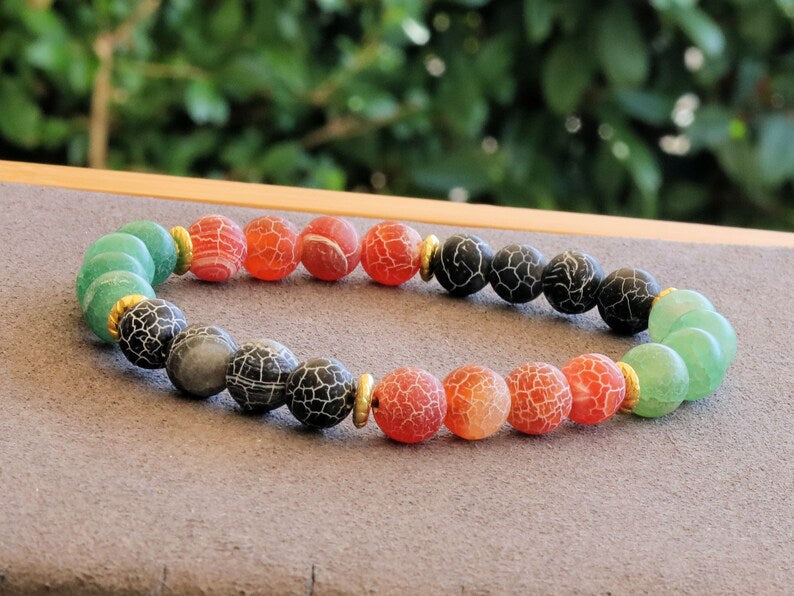 Top black,red and green Frosted Fire Crackle Agate bracelet with Tibetan Style Alloy Spacer Discs.The art of expressing your taste and style