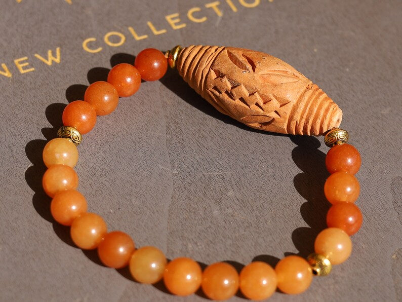 Orange Jade Chalcedony with Beautiful large handmade terracotta beads from Mali (Africa). And Tibetan Style Alloy Spacer Discs