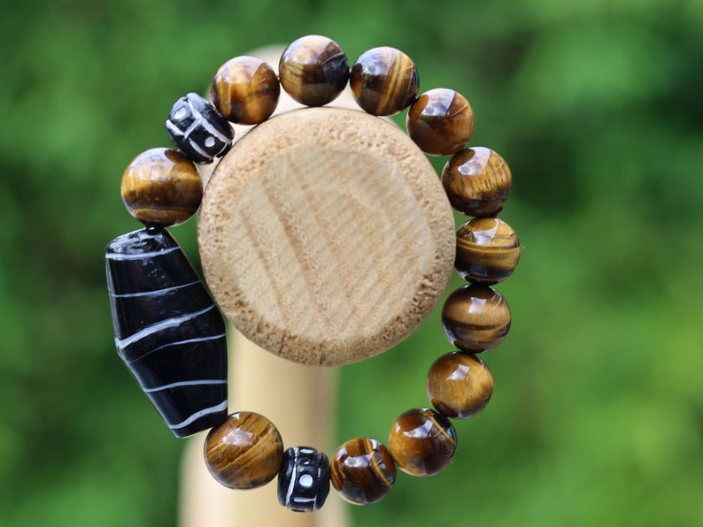 Handmade black/ white striped glass beads combined Tiger eye 12 beads. Tiger Eye stabilizes mood swings, imbues us with willpower