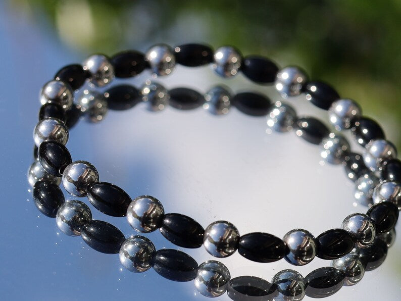 Natural Black Agate Barrel Beads. With Elegant 6mm Hematite Beaded Bracelet, a timeless accessory that combines style and substance.