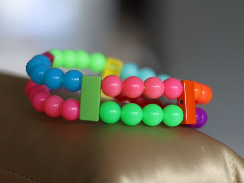 Introducing our stunning multi color Double-Row UV-Reactive Bracelet , the ultimate accessory to light up your night,UV Reactive Fluorescent