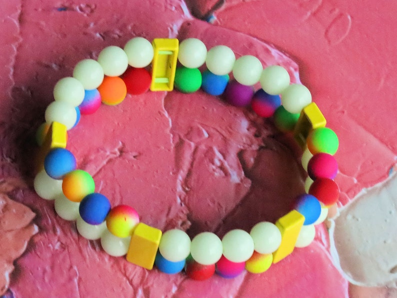 Introducing our stunning multi color Double-Row UV-Reactive Bracelet , the ultimate accessory to light up your night,UV Reactive Fluorescent