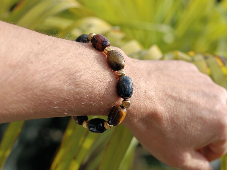 Appealing unique oval Tiger Eye beaded bracelets. With Stainless Steel Beads Gold Color 6mm Ribbed Cyclinder Tube Spacers.