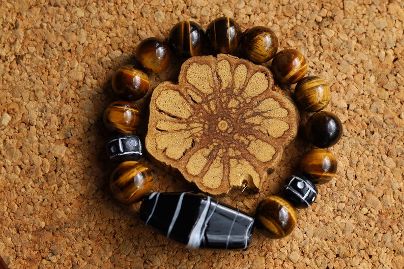 Handmade black/ white striped glass beads combined Tiger eye 12 beads. Tiger Eye stabilizes mood swings, imbues us with willpower