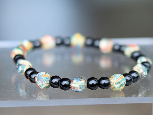 Thai prayer beads made from clay are known as Sai Sin or Buddhist prayer beads. With Black agate is believed to be a powerful stone