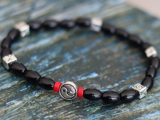 Unique Natural Black Agate Barrel Beads 6mm x 9mm. enhances creativity and strengthens the intellect, making it a beneficial stone