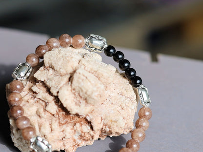 Crazy Horse Stone with black Agate and silver plated Tibetan spacer beads square. Elevate your style with our Unique Crazy Horse Stone Beaded Bracelet