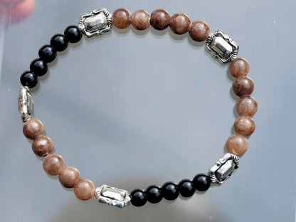 Crazy Horse Stone with black Agate and silver plated Tibetan spacer beads square. Elevate your style with our Unique Crazy Horse Stone Beaded Bracelet