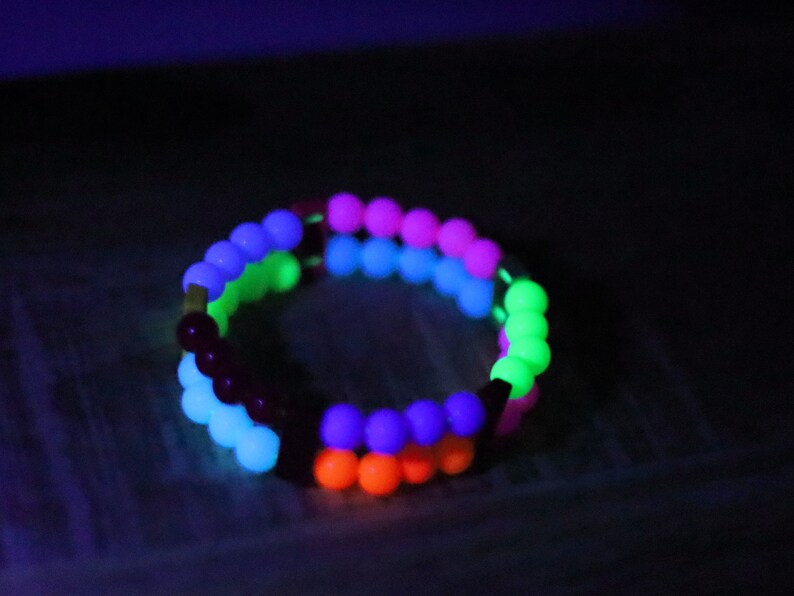 Introducing our stunning multi color Double-Row UV-Reactive Bracelet , the ultimate accessory to light up your night,UV Reactive Fluorescent