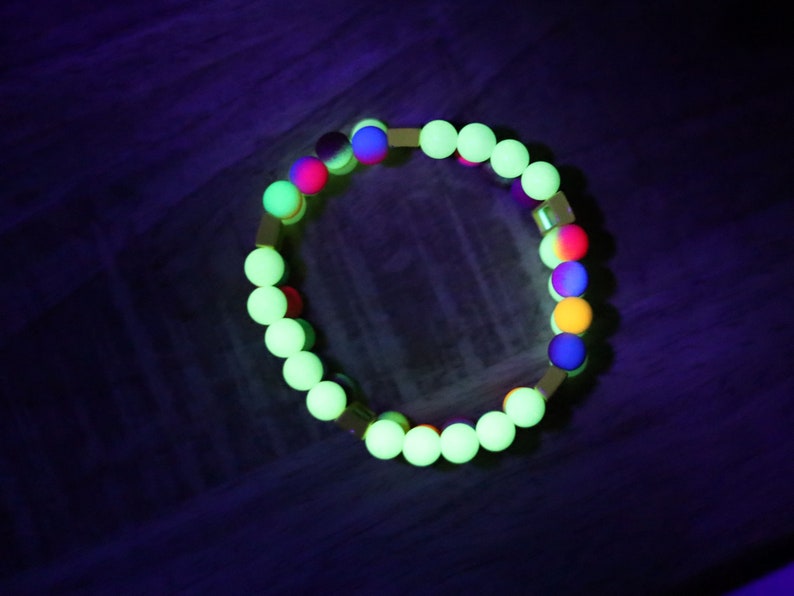 Introducing our stunning multi color Double-Row UV-Reactive Bracelet , the ultimate accessory to light up your night,UV Reactive Fluorescent