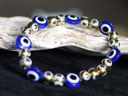 Round Handmade Evil Eye Lampwork Beads, Blue with Electroplate Glass, Round with Evil Eye Pattern, gold color. protecting the wearer