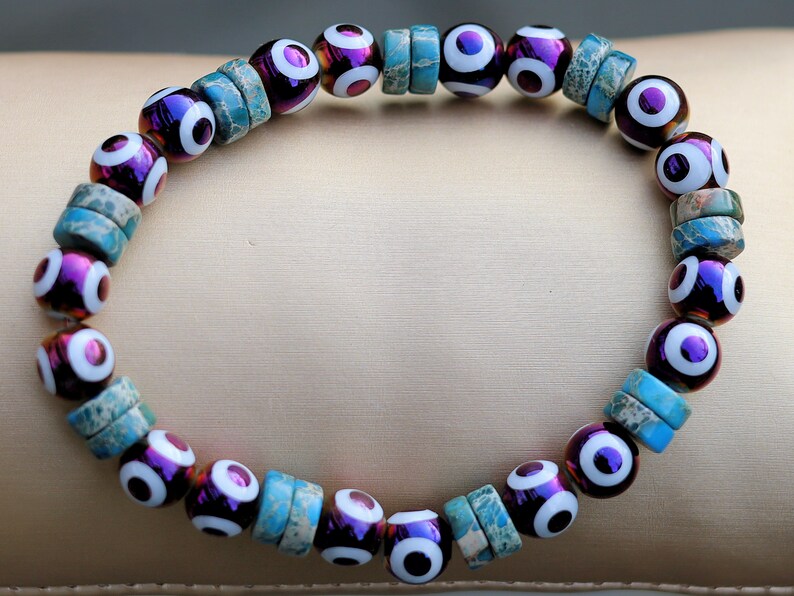 Round Handmade Evil Eye Lampwork Beads, Blue with Electroplate Glass, Round with Evil Eye Pattern, gold color. protecting the wearer