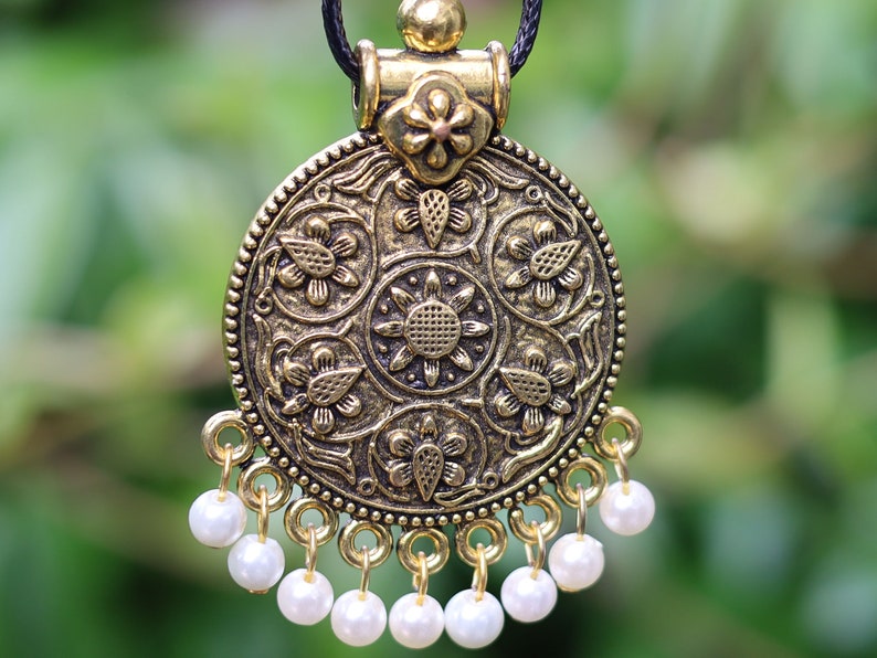 Antique Gold Large Round Tribal  Locket Charms Pendant necklace. month flower motive, Multi hole antiqued gold plated base metal, floral design