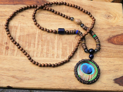 wooden beads peacock feather necklace. Weight: about 20 grams. Pendant size: round: 4.9*4.9*1.3cm; ellipse: 5.2*4.1*1.1cm