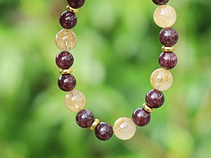Red Garnet represents love with 10 mm Rutilated Quartz and Brass Spacer Beads. is known for its striking and beautiful appearance