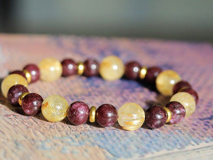 Red Garnet represents love with 10 mm Rutilated Quartz and Brass Spacer Beads. is known for its striking and beautiful appearance