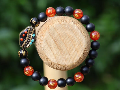 8MM Feng Shui Red Color obsidian With Buddhist Words Om Mani Padme Hum Mantra. The jewel is in the lotus.