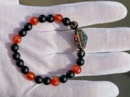8MM Feng Shui Red Color obsidian With Buddhist Words Om Mani Padme Hum Mantra. The jewel is in the lotus.