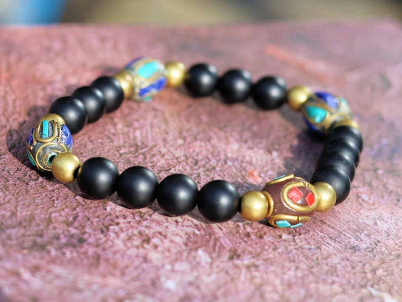 Nepal model Shaligram Super rare Natural black round bracelets. With Nepalese brass decorative round beads. Handmade in Nepal.