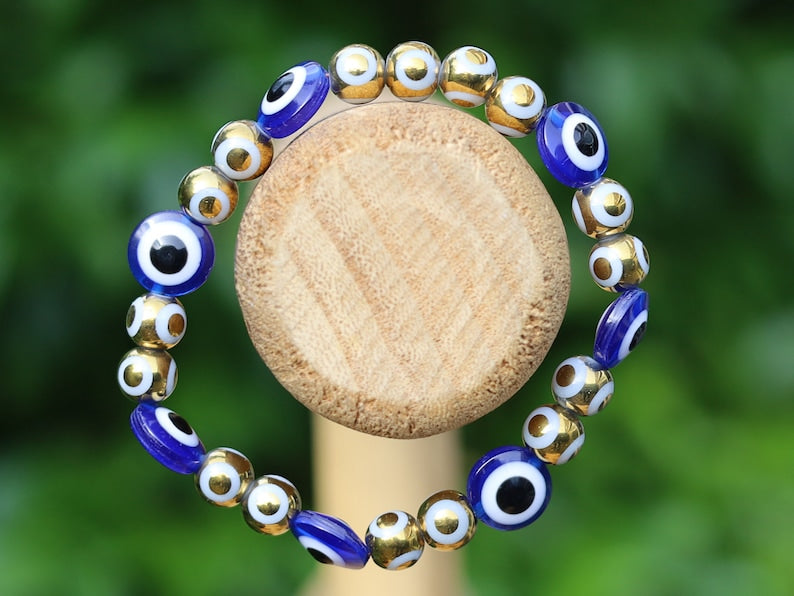 Round Handmade Evil Eye Lampwork Beads, Blue with Electroplate Glass, Round with Evil Eye Pattern, gold color. protecting the wearer