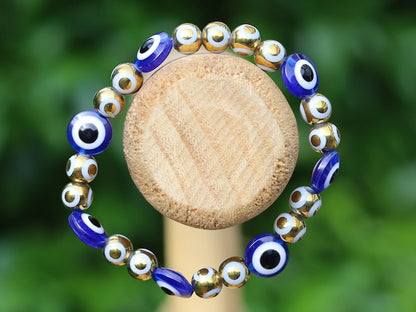 Round Handmade Evil Eye Lampwork Beads, Blue with Electroplate Glass, Round with Evil Eye Pattern, gold color. protecting the wearer
