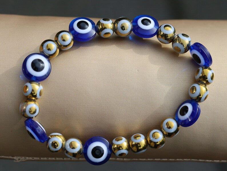 Round Handmade Evil Eye Lampwork Beads, Blue with Electroplate Glass, Round with Evil Eye Pattern, gold color. protecting the wearer