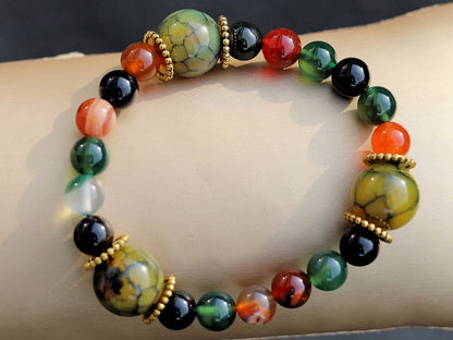 A mixed color agate beads bracelet with green/ black Dragon veins natural jade and Gold Plated Spacer Beads. the scales or veins of a dragon