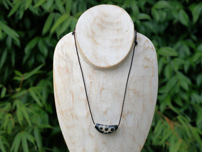 Unique shape DZI. The "Lightning" pattern in relation to Dzi beads refers to a specific type of Dzi bead that has a unique appearance resembling a lightning bolt or zigzag pattern.