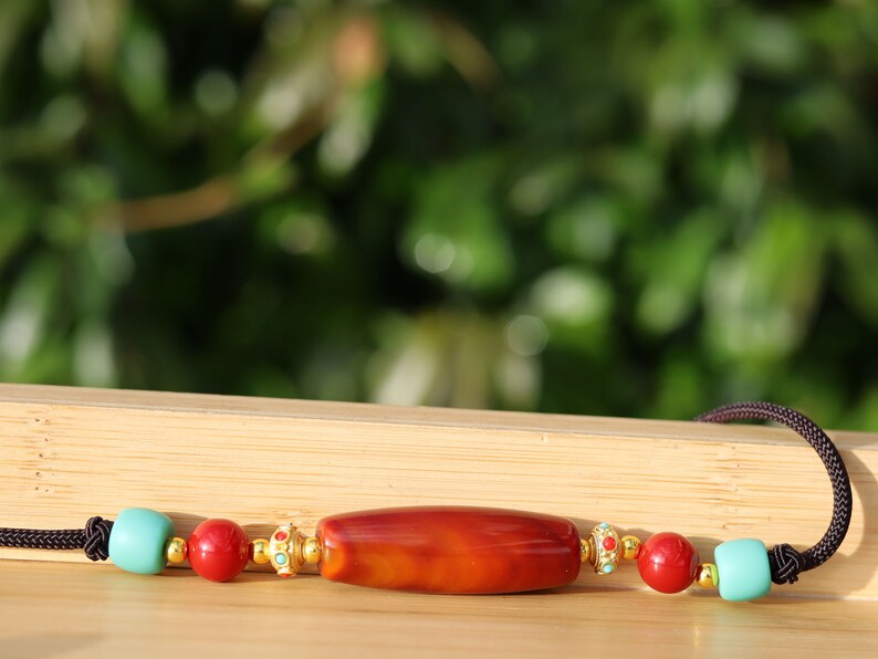 Carnelian Onyx DZI bead Agate Stone Choker, with an adjustable necklace with a slide knot.  Features red and  turquoise spacer beads.