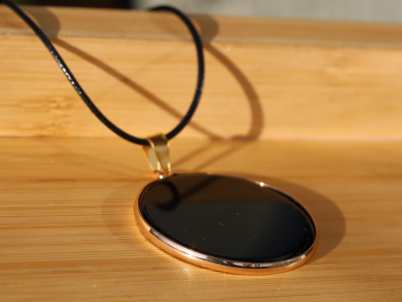 Black mirror Obsidian Natural Stone Disc Shape Pendant.Obsidian Natural Stone Disc Shape Pendant,often referred to as a black mirror.3 SIZES