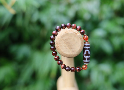Old Bodhi Dzi  bead Tiger eye bracelet with Black agate.These beads are believed to bring spiritual benefits and protection to the wearer