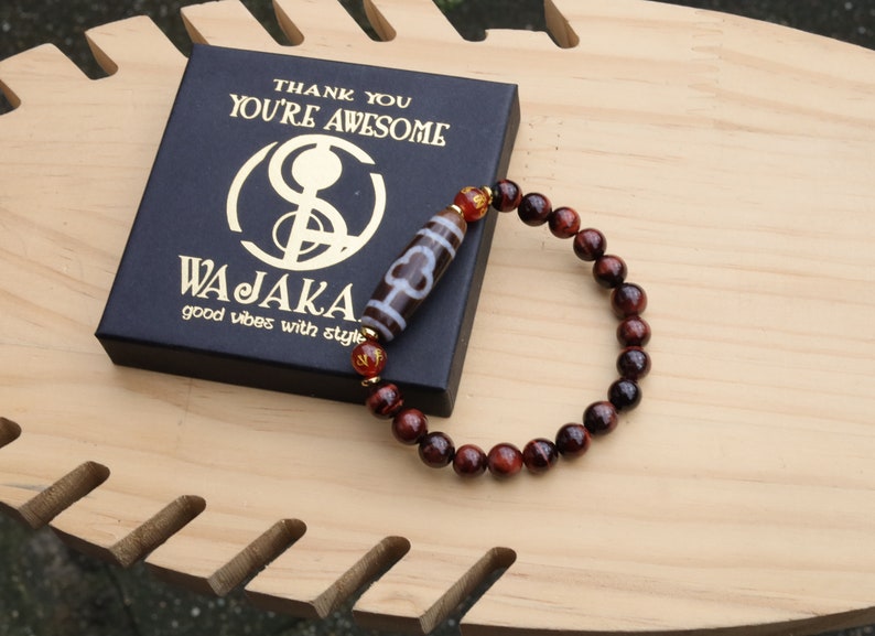 Old Bodhi Dzi  bead Tiger eye bracelet with Black agate.These beads are believed to bring spiritual benefits and protection to the wearer